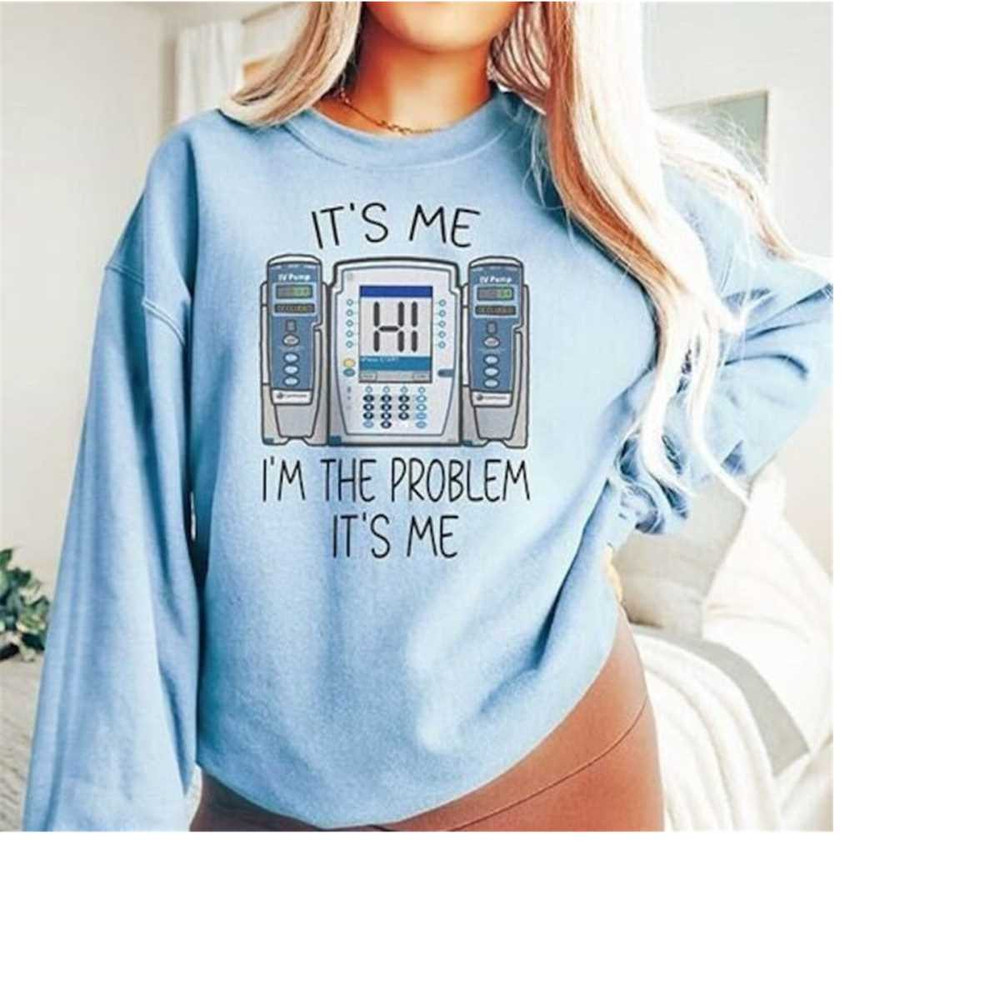 MR-2682023125521-funny-nurse-sweatshirt-im-the-problem-iv-pump-crewneck-light-blue.jpg