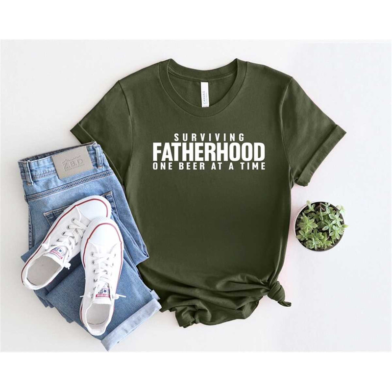 MR-2682023153659-surviving-fatherhood-one-beer-at-a-time-shirt-best-dad-ever-image-1.jpg