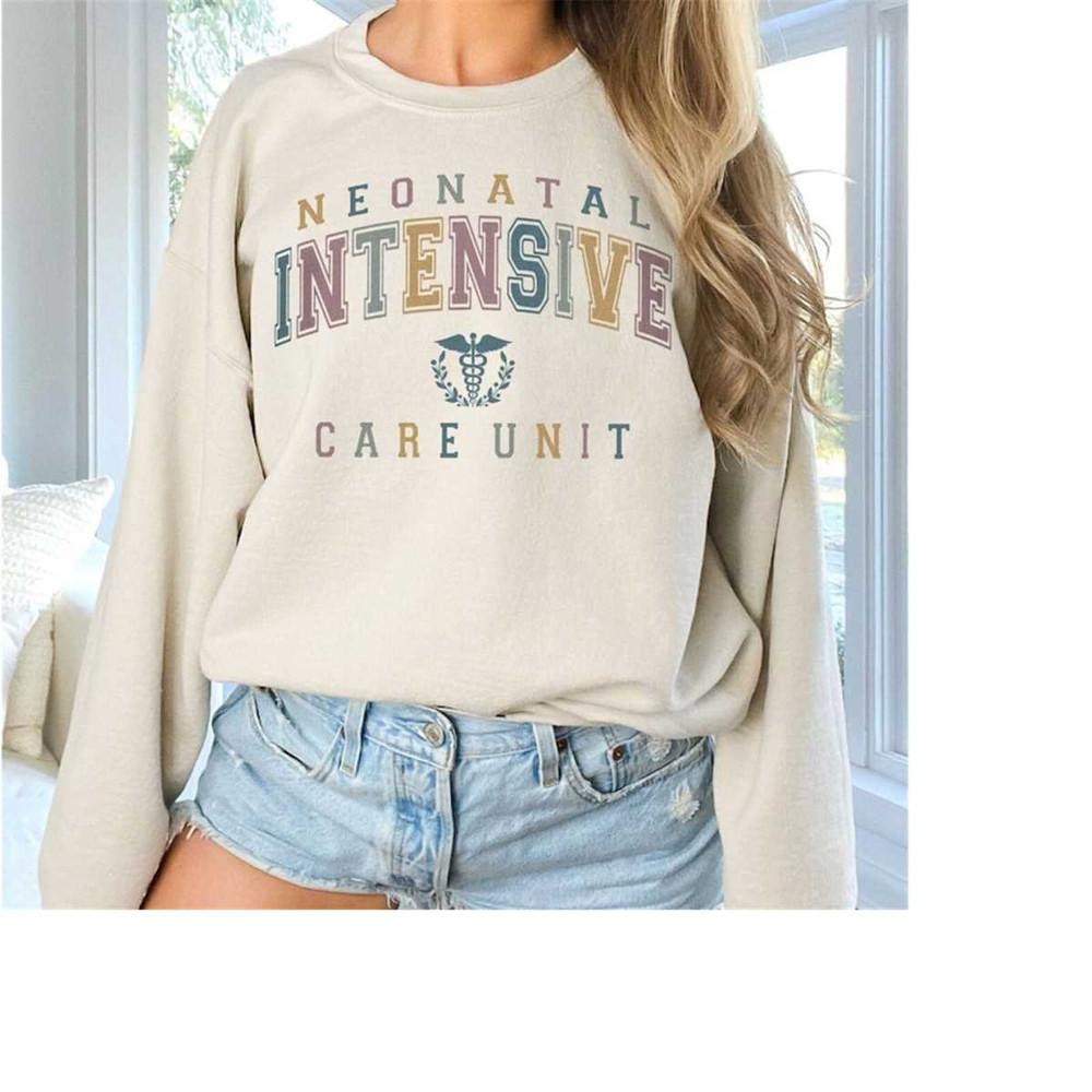 MR-2682023154248-varsity-nicu-nurse-crewneck-sweatshirt-collegiate-neonatal-sand.jpg