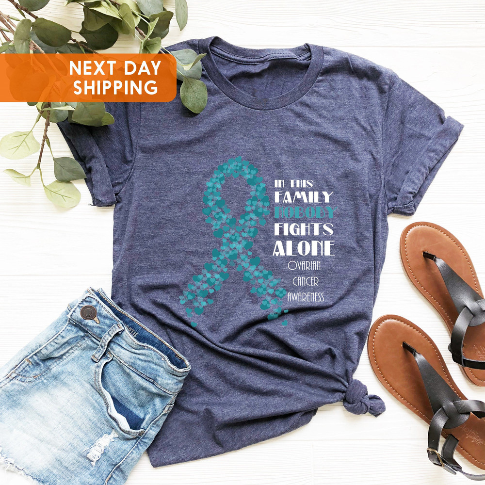 Ovarian Cancer Awareness Unisex T-shirt, In This Family Nobody Fights Alone, Awareness Month, Cancer Warrior Tee, Cancer, Support Squad Gift - 2.jpg