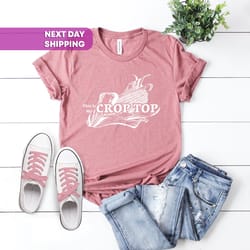 the only true crop top is the corn husker field t-shirt, far