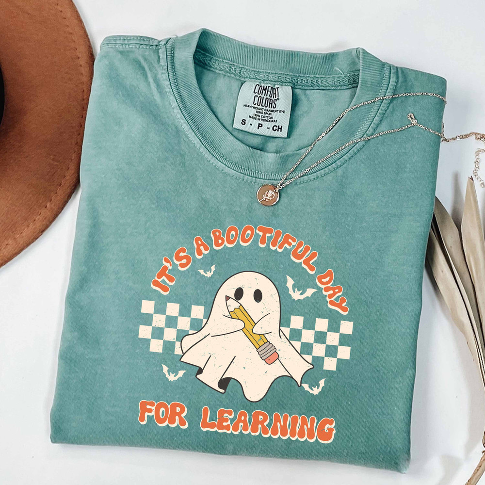 Comfort Colors® It's A Bootiful Day For Learning Teacher Halloween Shirt, Ghost Teacher Shirt, Trick Or Teach Shirt, Cute Ghost With Pencil - 1.jpg