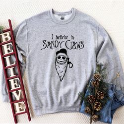 a nightmare before christmas inspired sweatshirt,zero ghost dog,jack skellington,this is halloween,sandy claws,tim burto