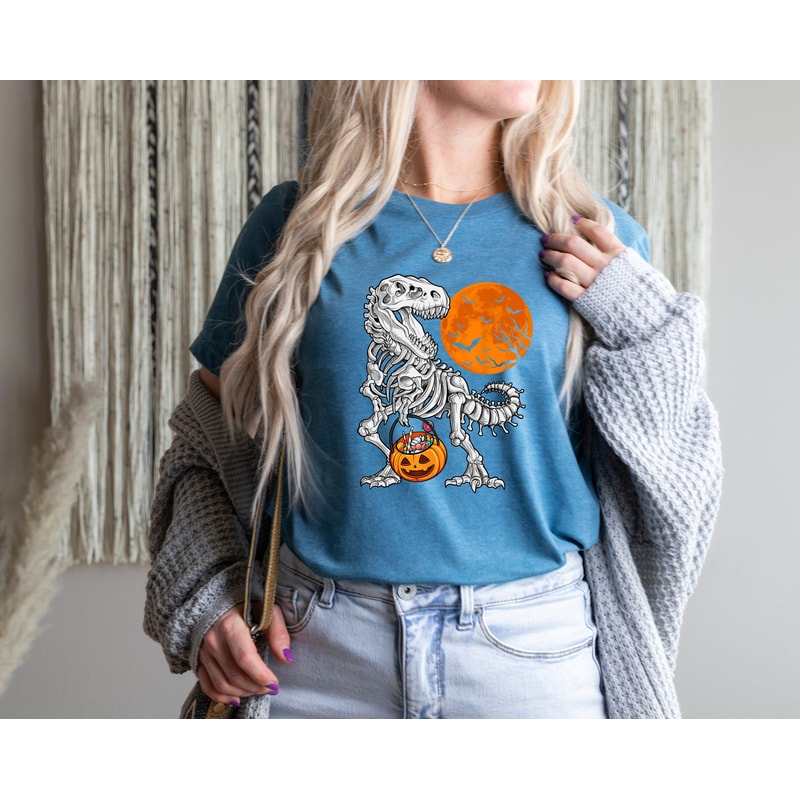 Halloween Skeleton Dinosaur Shirts, Kids Dinosaur Skeleton T-Rex Shirts, Scary and Spooky Dinosaur Tees, Cute Halloween Apparel For Kids - 1.jpg