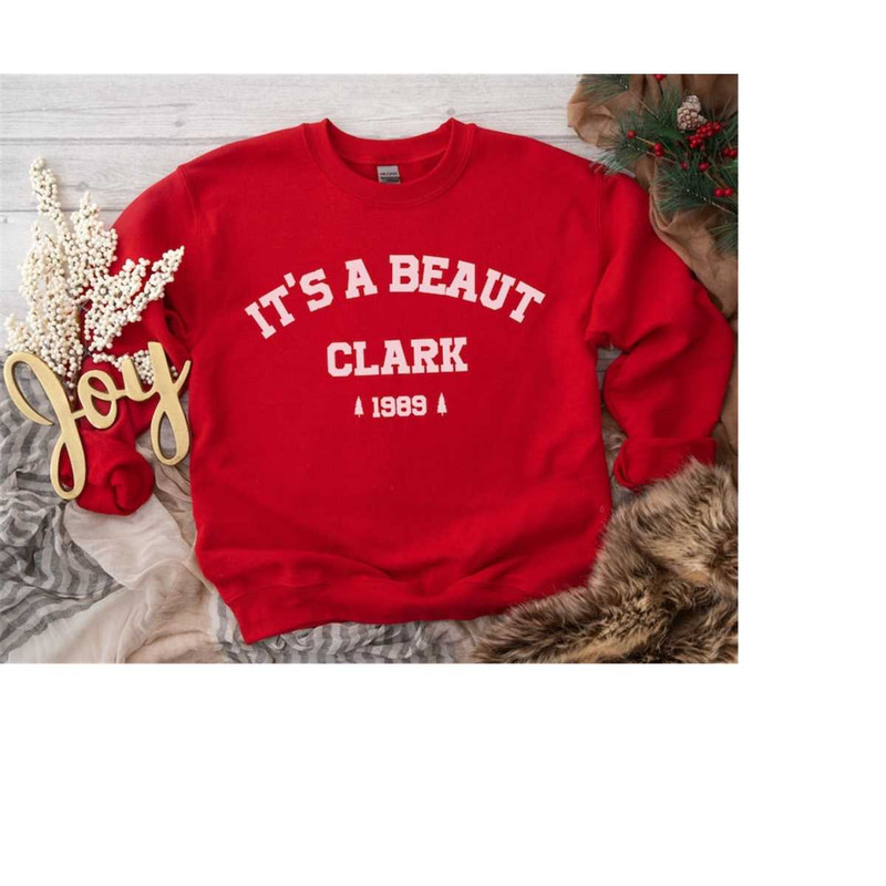 MR-79202394532-its-a-beaut-clark-sweatshirt-funny-christmas-sweatshirt-image-1.jpg