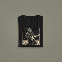 bigfoot playing guitar t shirt | cool electric guitar shirts sasquatch tee vintage band bass for men women kids player c
