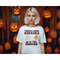 MR-9920239125-funny-halloween-sweatshirt-theres-some-horrors-in-this-image-1.jpg