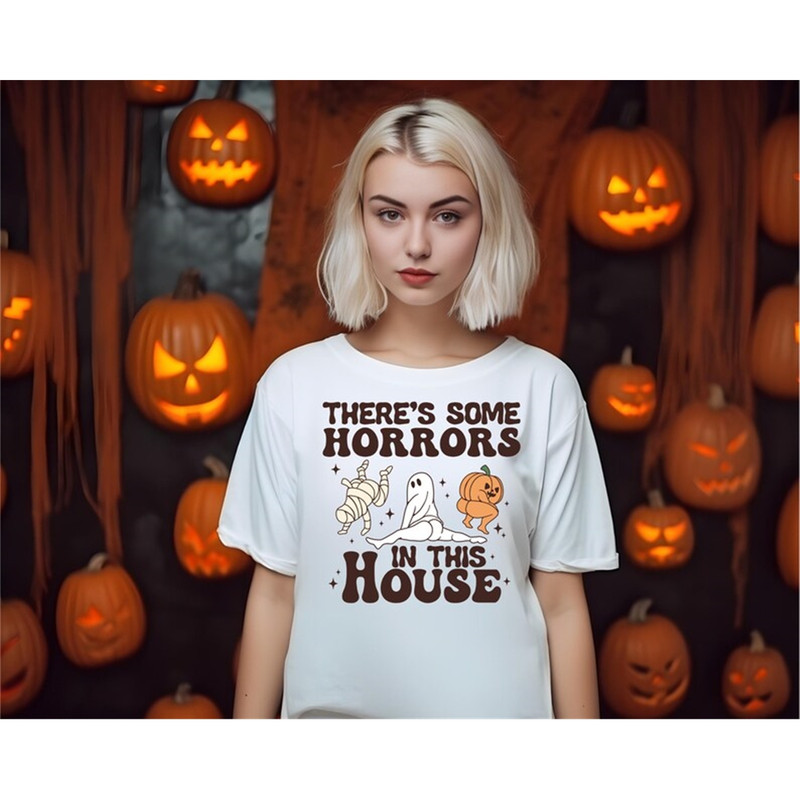 MR-9920239125-funny-halloween-sweatshirt-theres-some-horrors-in-this-image-1.jpg