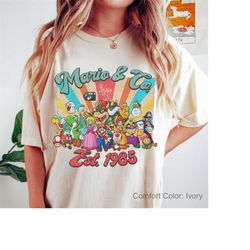 vintage super mario comfort shirt, the super mario bros movie, main street usa, mario trip shirt, cute super mario, retr