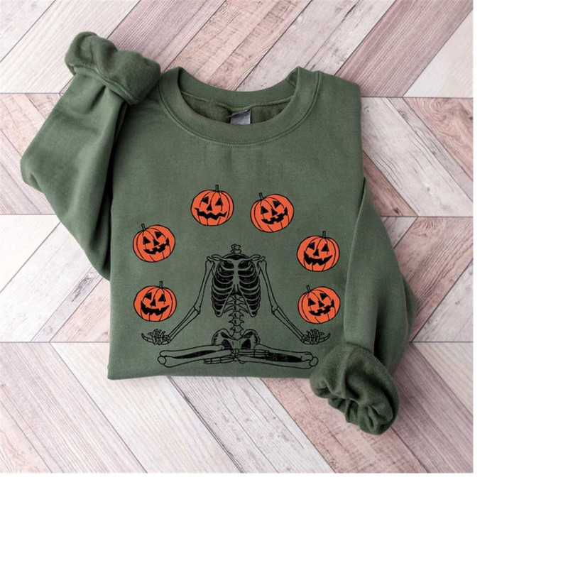 MR-119202391847-skeleton-throwing-pumpkin-sweatshirt-pumpkin-halloween-image-1.jpg