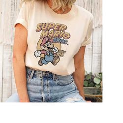 vintage super mario comfort shirt, the super mario bros movie, main street usa, mario trip shirts, cute super mario, ret