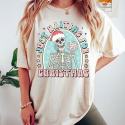 comfort colors just waiting for christmas shirt, skeleton christmas tshirt, funny christmas shirt, christmas shirts for