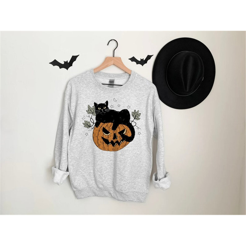 MR-129202382439-black-cat-on-pumpkin-sweatshirt-halloween-sweatshirt-cat-image-1.jpg