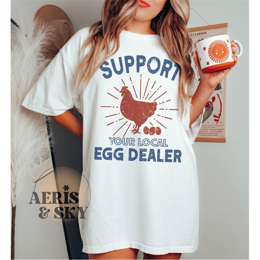 MR-12920239433-support-your-local-egg-dealer-shirt-retro-graphic-tee-image-1.jpg