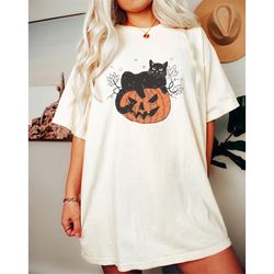 black cat on pumpkin comfort colors shirt, black cat t-shirt, halloween black cat design, fall shirt, halloween sweatshi