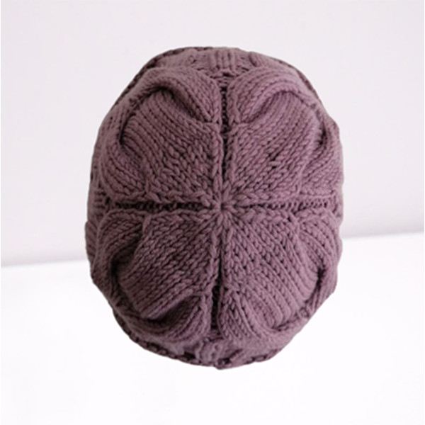 Knitted hat with lapel and braids 15.jpg