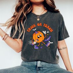 halloween teacher shirt, trick or teach shirt, retro pumpkin teacher shirt, teacher retro halloween shirt, spooky teache
