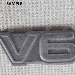 V6 Emblem