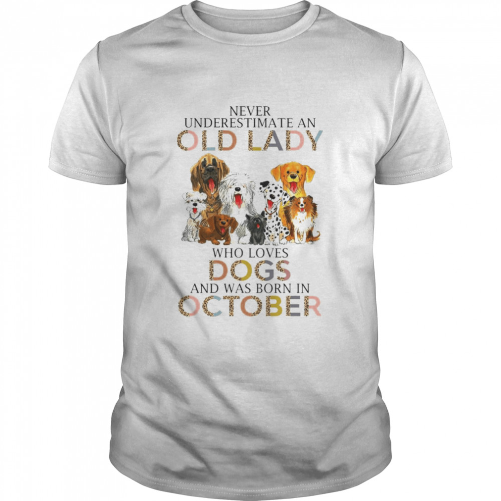 Never Underestimate An Old Lady Who Loves Dogs And Was Born In October Shirt.jpg