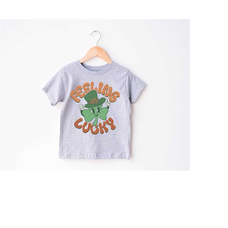 MR-1492023175421-smiley-shamrock-st-pattys-shirt-toddler-tee-st-patricks-day-image-1.jpg
