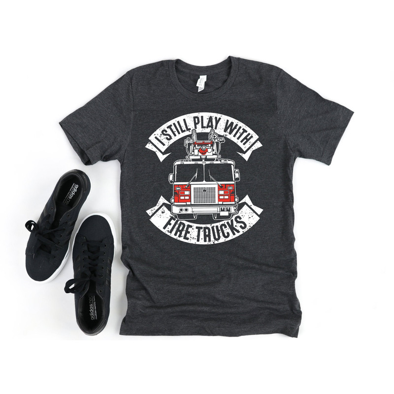 Funny Firefighter Shirt, Hoodie, Mens Fireman Gift, I still play with Fire Trucks, Firefighter Gift, Funny Fireman Shirt.jpg