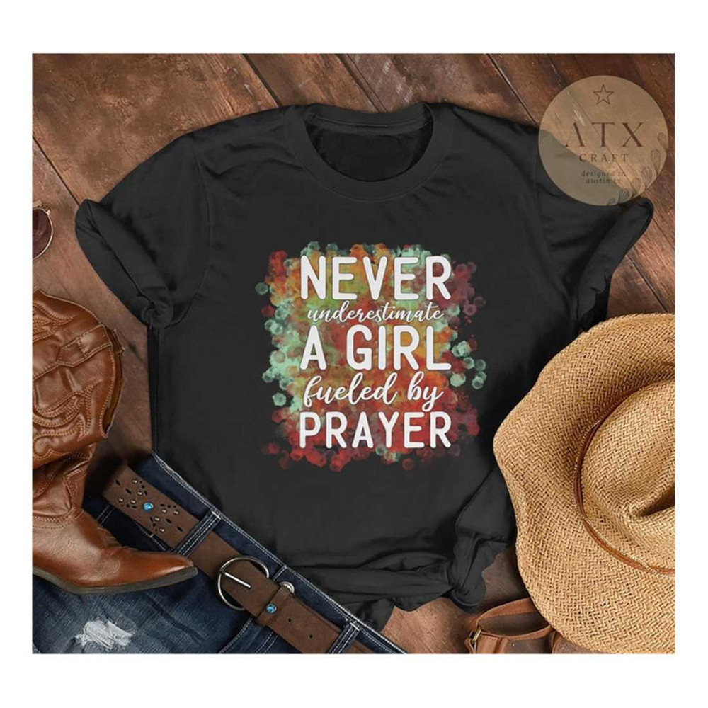 MR-189202385736-never-underestimate-a-girl-fueled-by-prayer-prayer-shirt-image-1.jpg