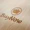 59 Buy Now Wood Engraved Logo Mockup.jpg