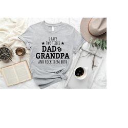 i have two titles dad and grandpa and i rock them both shirt,funny father shirt,father's day shirt,new grandpa shirt,fun