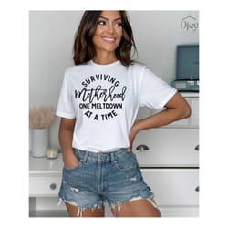 motherhood shirt, funny mom t shirts, surviving motherhood one meltdown at a time, mothers day shirt, mothers day gift,