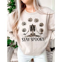 stay spooky halloween crewneck sweatshirt, halloween sweatshirt, stay spooky ghost t-shirt, pumpkin skeleton sweatshirt
