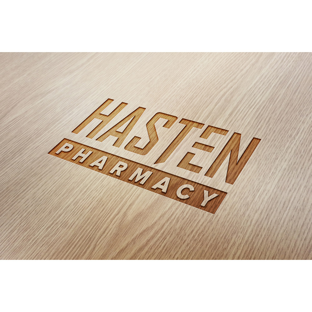 134 Hasten Pharmacy Wood Engraved Logo Mockup.jpg
