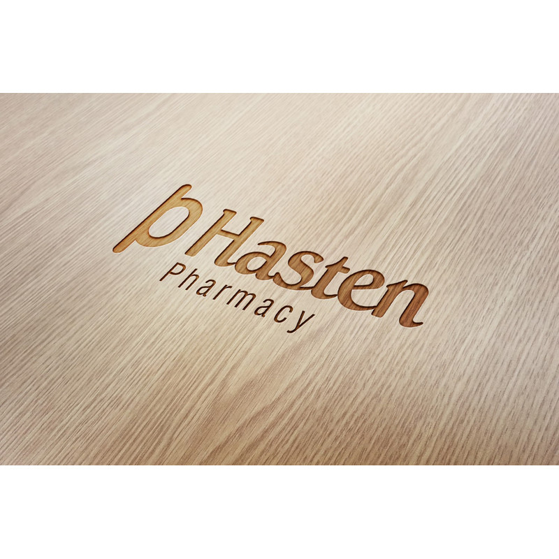 136 Hasten Pharmacy Wood Engraved Logo Mockup.jpg