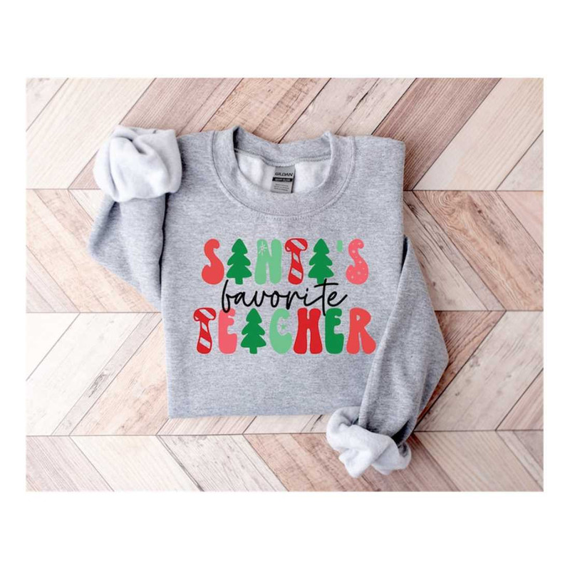 MR-2292023155322-santas-favorite-teacherteacher-christmas-sweatshirtlove-image-1.jpg