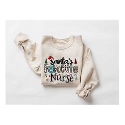 santa's favorite nurse sweatshirt christmas nurse sweatshirt er nurse crewneck sweatshirt nurse christmas tshirt for nur