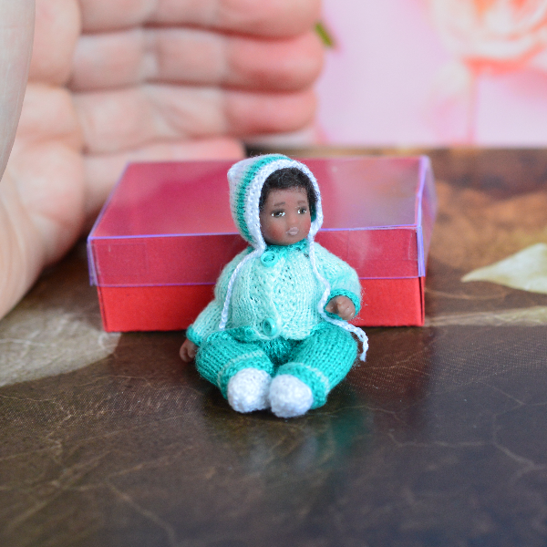 A- baby- for- the- dollhouse-