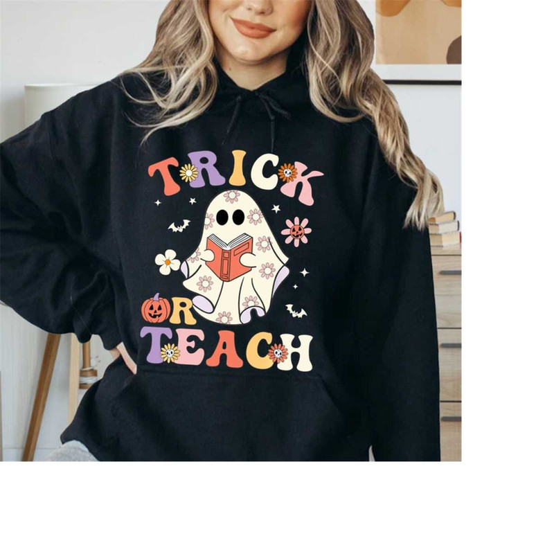 MR-269202394641-teacher-hoodie-trick-or-teach-floral-ghost-hoodie-teacher-image-1.jpg