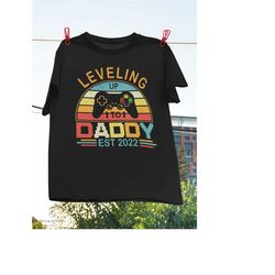 leveling up to daddy 2022 t-shirt, papa shirt, pregnancy announcement, new dad shirt, first time daddy shirt, gift for h