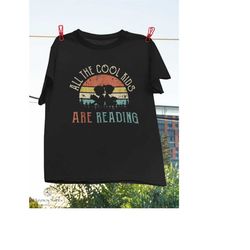 all the cool kids are reading book sunset vintage t-shirt, reader shirt, reading kids shirt, reading lovers shirt, knowl