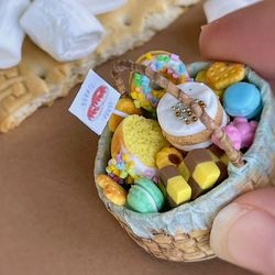 Miniature basket for a dollhouse with sweets in scale 1:12