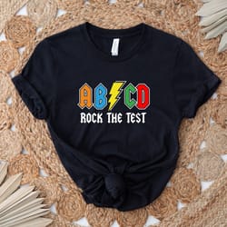 rock the test abcd teacher t-shirt rock and roll teacher testing shirt state testing shirt fsa teacher shirt, motivat