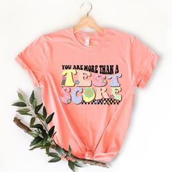 you are more than a test score shirt,testing shirt,teacher shirts,teacher team shirts,test day shirt,testing coordinator