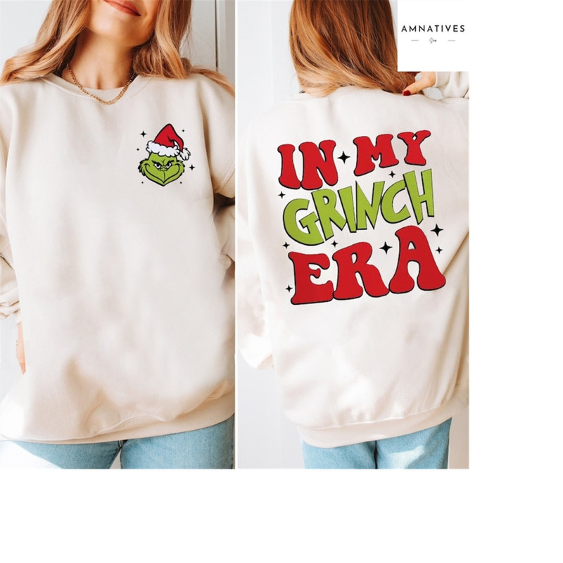 MR-2892023103644-in-my-grinch-era-christmas-grinch-christmas-sweatshirt-image-1.jpg