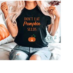 don't eat pumpkin seeds maternity halloween shirt, pregnancy announcement shirt, pregnancy revealing shirt, expecting mo
