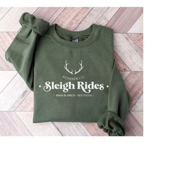 reindeer sleigh rides sweatshirt, reindeer sweatshirt, sleigh rides sweatshirt, iprintasty christmas, santa claus sleigh