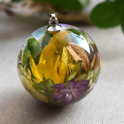Sphere pendant real flowers. Bouquet of flowers sphere pendant. Real saffron jewelry.