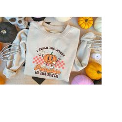 halloween teacher sweatshirt,fall teacher shirts,pumpkin teacher tee,i teach the cutest pumpkins in the patch sweater,cu
