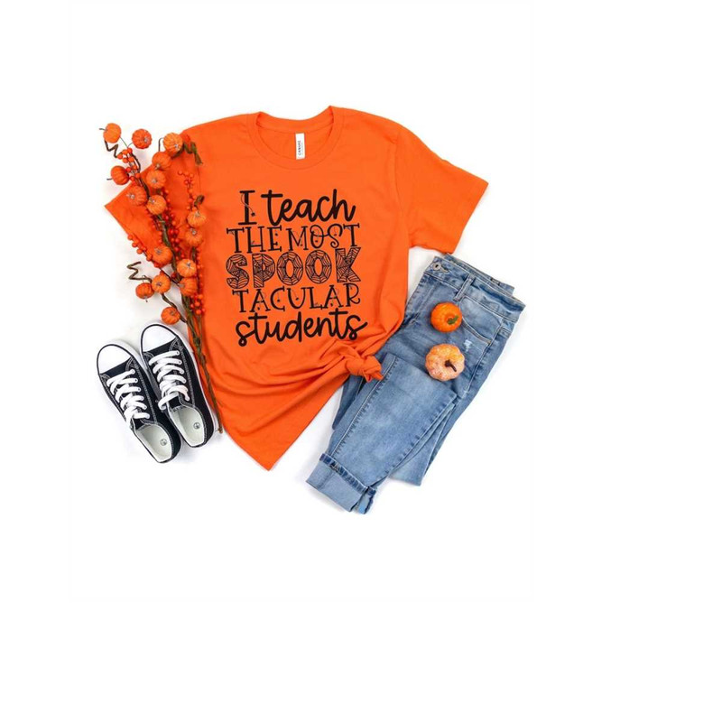 MR-29920239126-halloween-teacher-shirt-i-teach-the-most-spooktacular-students-image-1.jpg