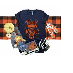 thick thighs and witch vibes shirt, funny halloween shirt, spooky shirt, halloween shirts, cute halloween, funny hallowe