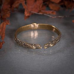 Metal bracelet with wolf heads. Brass viking circle bangle for him. Man Pagan handcrafted jewelry.