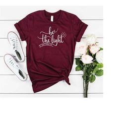 Be The Light Shirt, Faith T Shirts, Christian Tees For Women, Christian Shirts, Christian Apparel, Christian Shirts For